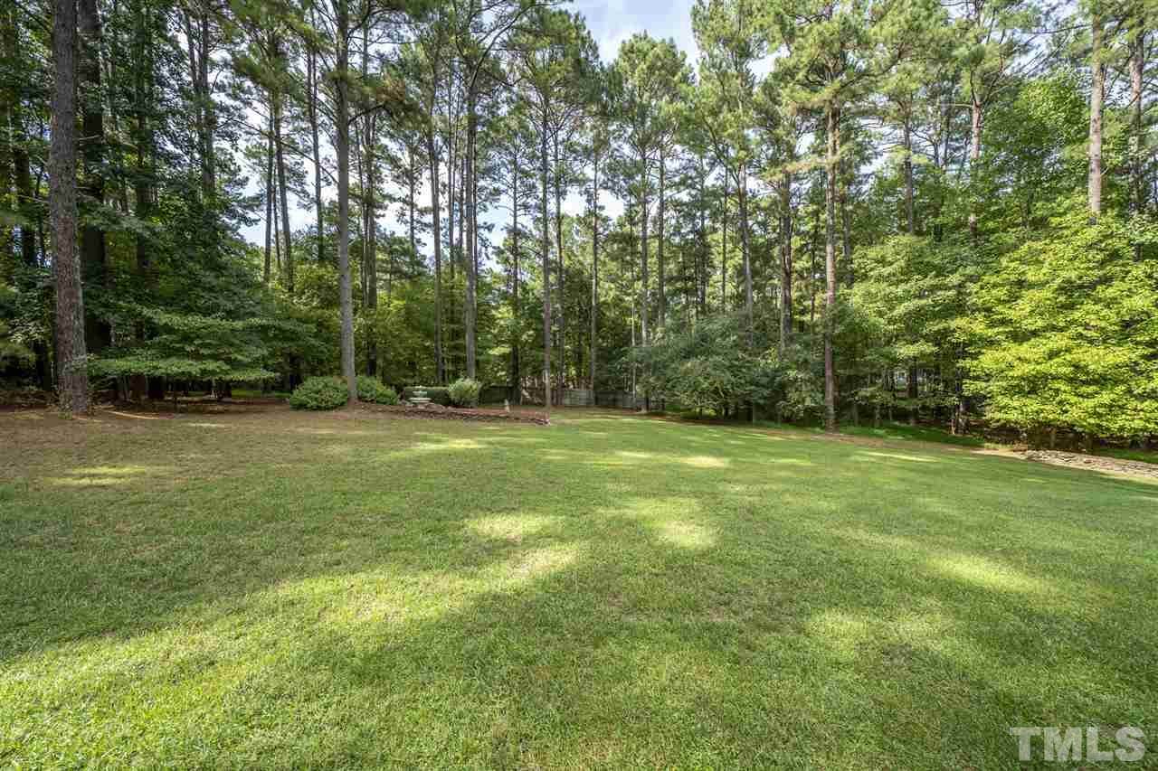 209 Claflin Court Raleigh, NC 27614 - Photo 27 of 30 Large, flat, fenced, private backyard is large enough to install a custom pool and cabana.
