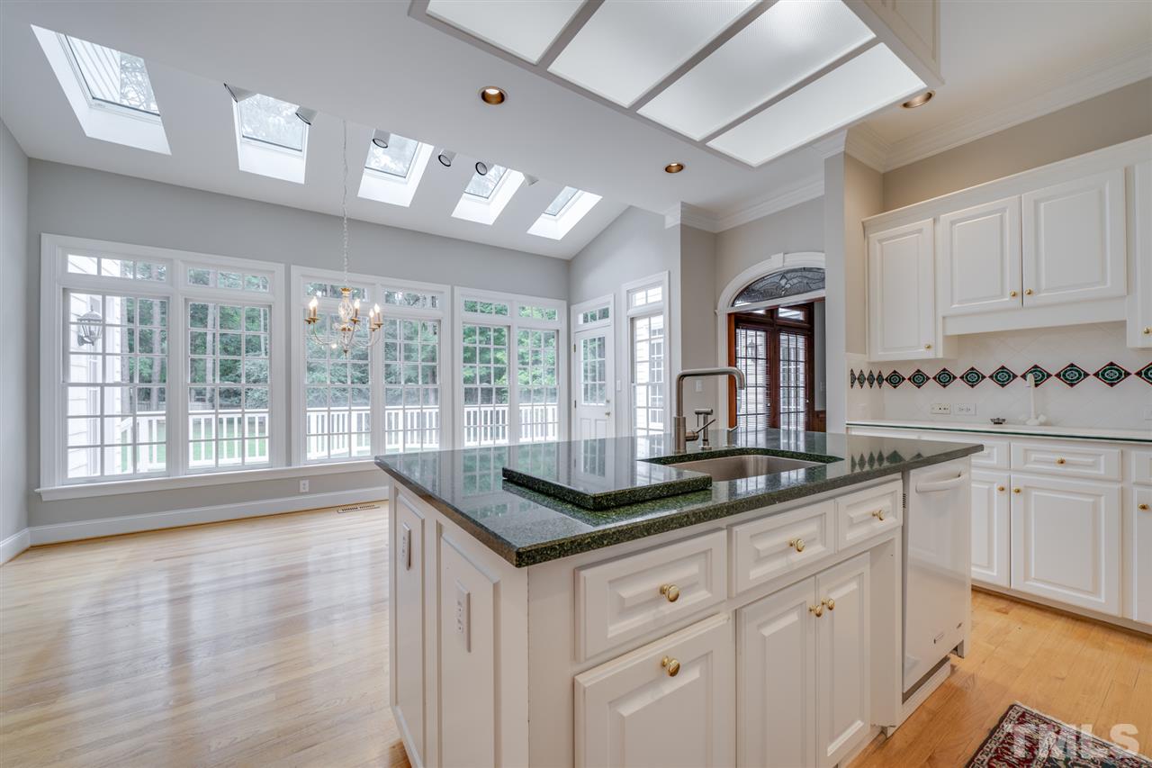 209 Claflin Court Raleigh, NC 27614 - Photo 7 of 30 Beautiful open kitchen for entertaining friends or preparing a family meal for the holidays.