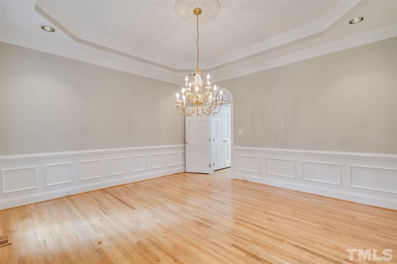 209 Claflin Court Raleigh, NC 27614 - Photo 10 of 30 This grand formal dining room is a focal point for entertaining.