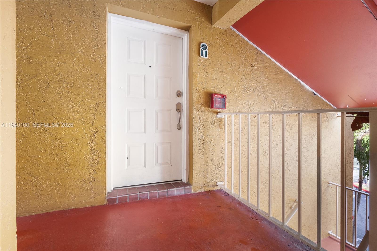 15520 Southwest 80th Street, Unit B301 Miami, FL 33193 - Photo 7 of 26 an empty room with windows