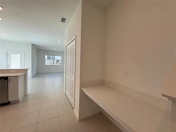 a bathroom with a sink toilet and a mirror