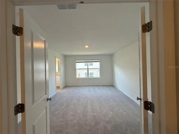 a bathroom with a sink a vanity and a mirror