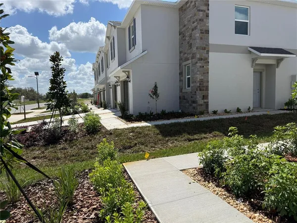 a view of a street from a corridor