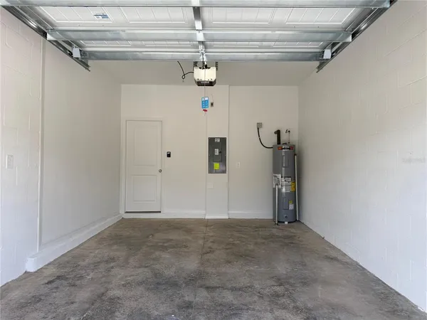 a view of a porch and potted plants