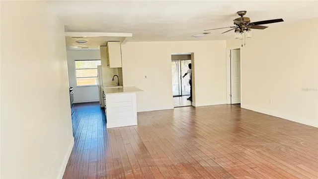 a view of a livingroom with wooden floor