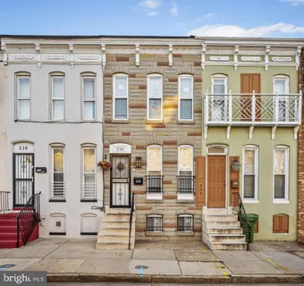 a front view of a building with windows