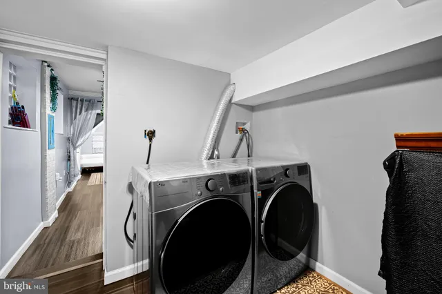 a utility room with dryer and washer