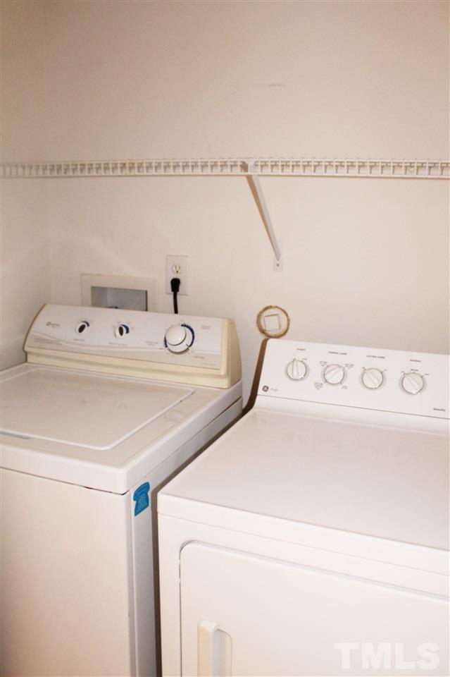 5022 Gable Ridge Drive Durham, NC 27713 - Photo 12 of 24 a utility room with dryer and washer