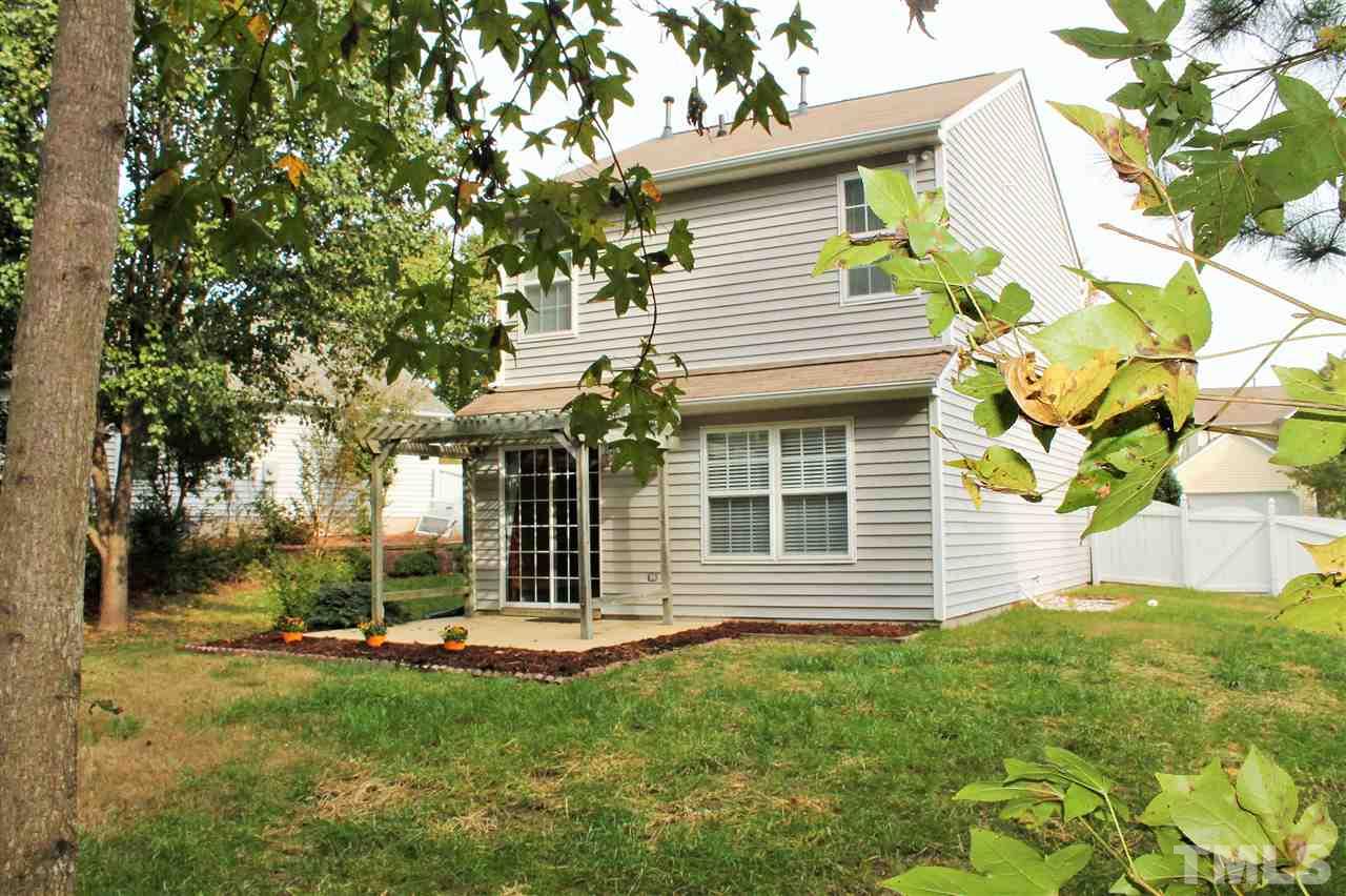 5022 Gable Ridge Drive Durham, NC 27713 - Photo 21 of 24 a view of a house with a backyard