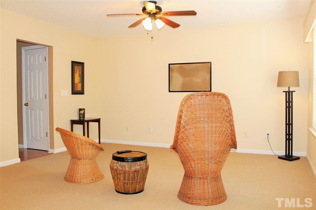5022 Gable Ridge Drive Durham, NC 27713 - Photo 4 of 24 a living room with furniture and a window