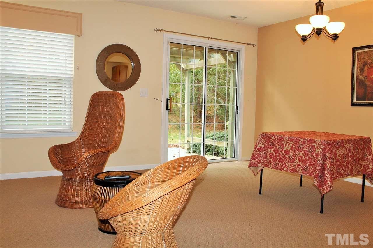 5022 Gable Ridge Drive Durham, NC 27713 - Photo 5 of 24 a living room with furniture and a large window