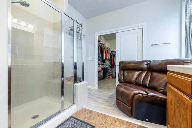 a view of outdoor space with seating area and trees