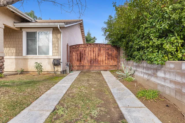 a view of a backyard with a small cabin