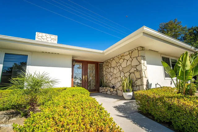 a house view with a sitting space