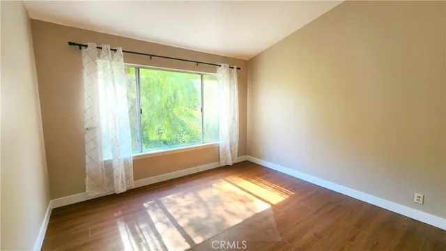 a view of an empty room and window