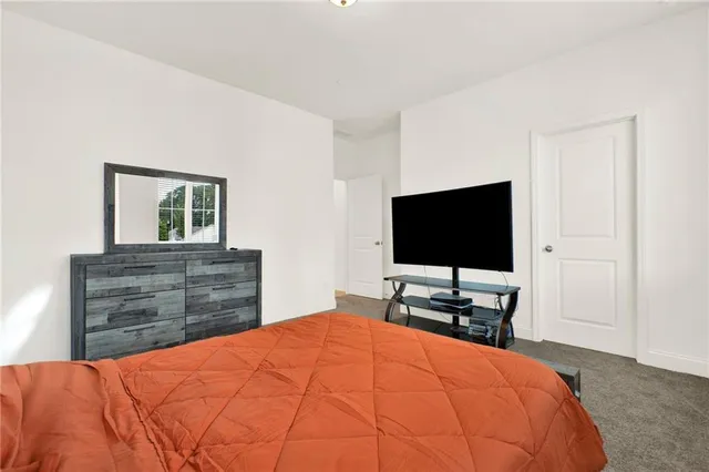 a living room with furniture and windows