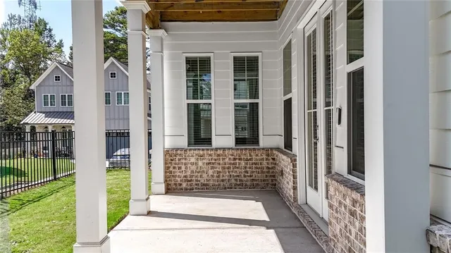 a front view of a house with a porch