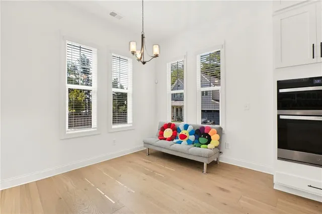 a living room with furniture and window