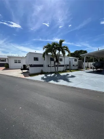 a view of a street with cars
