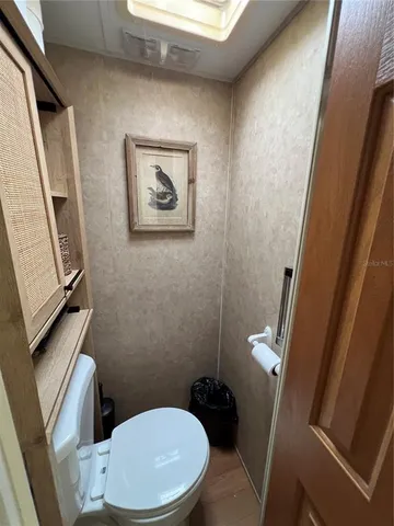 a kitchen with a sink appliances and cabinets