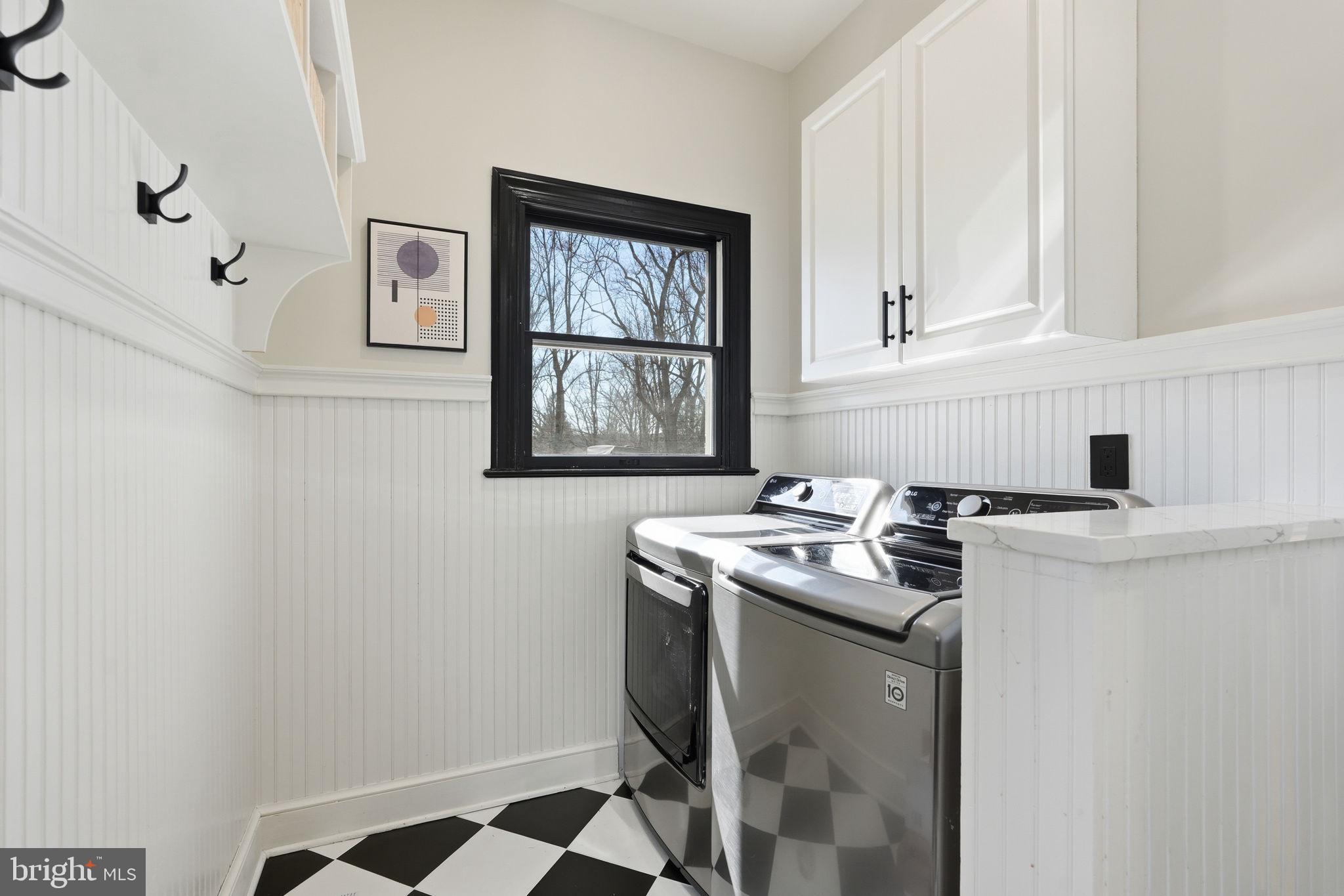 310 Springvale Road Great Falls, VA 22066 - Photo 24 of 59 a kitchen with stainless steel appliances a stove a sink and a refrigerator