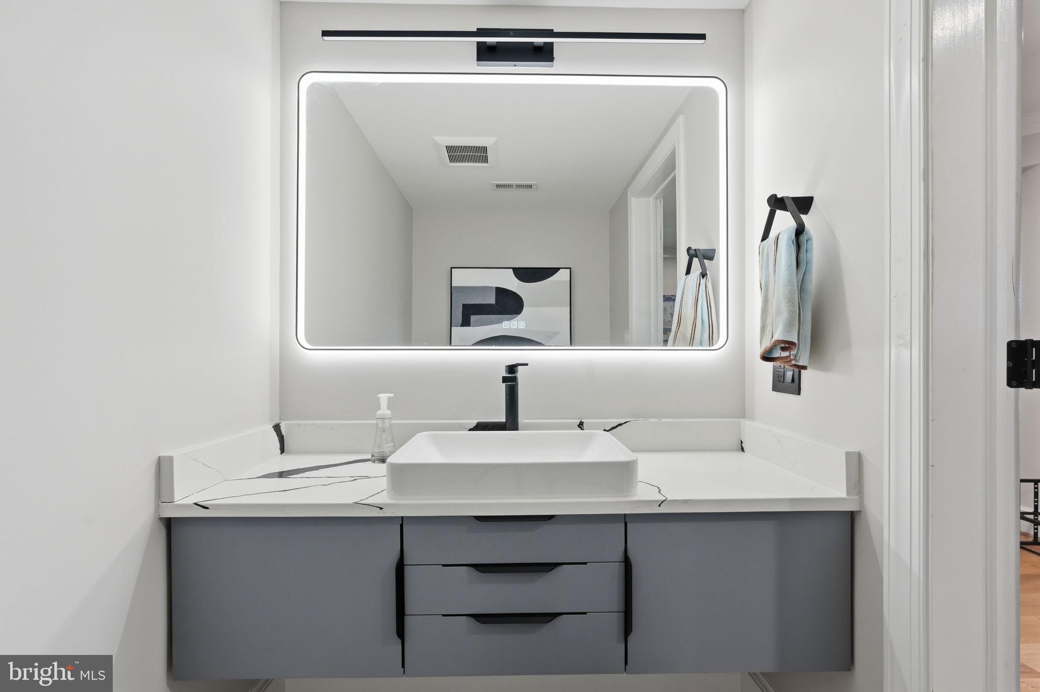 310 Springvale Road Great Falls, VA 22066 - Photo 39 of 68 Lower Level Half Bath