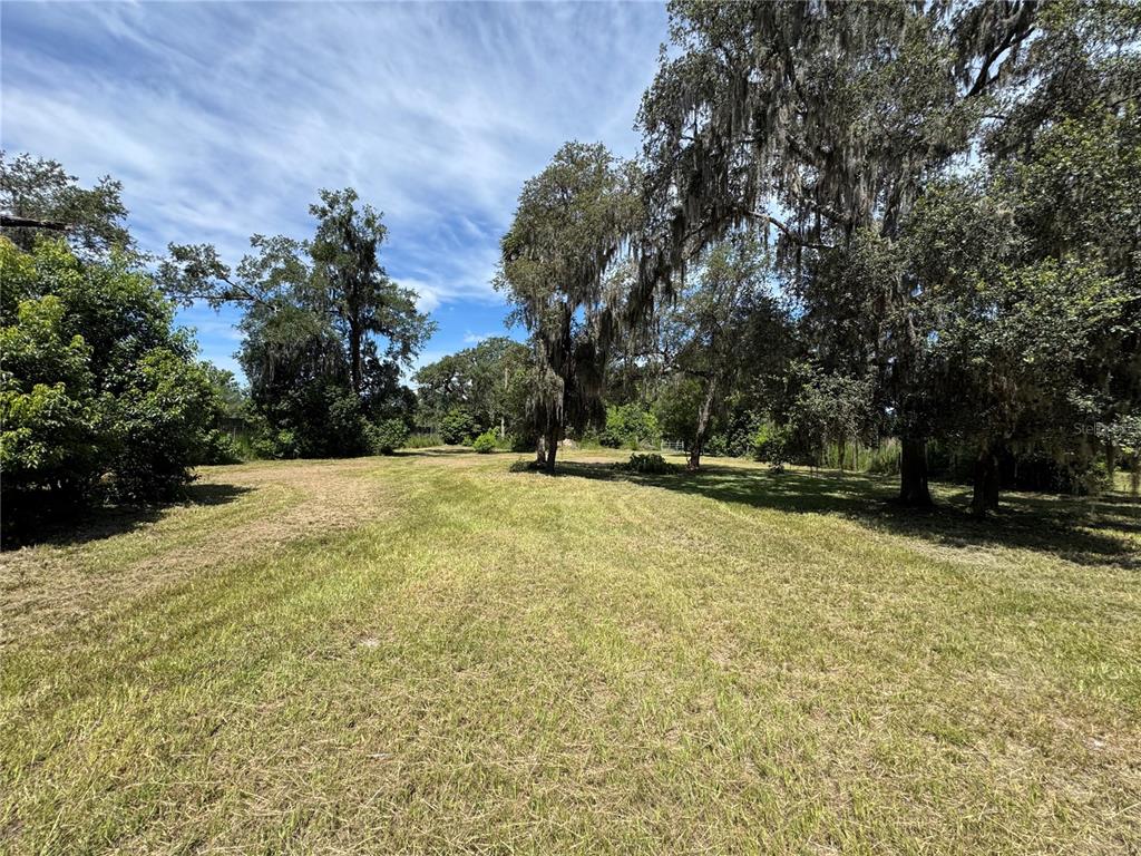 850 Menton Road Pierson, FL 32180 - Photo 11 of 24 a view of swimming pool with an outdoor space