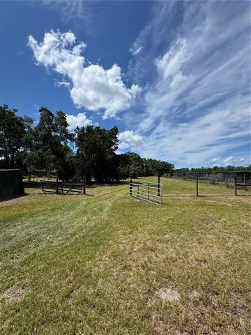 a view of a golf course with a lake