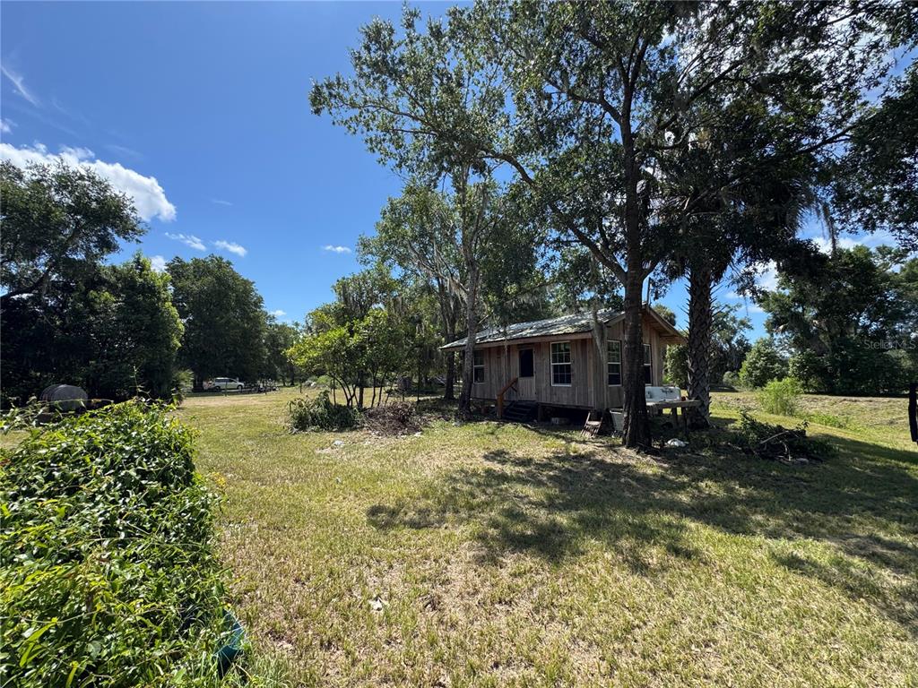 850 Menton Road Pierson, FL 32180 - Photo 27 of 35 a view of a house with a yard
