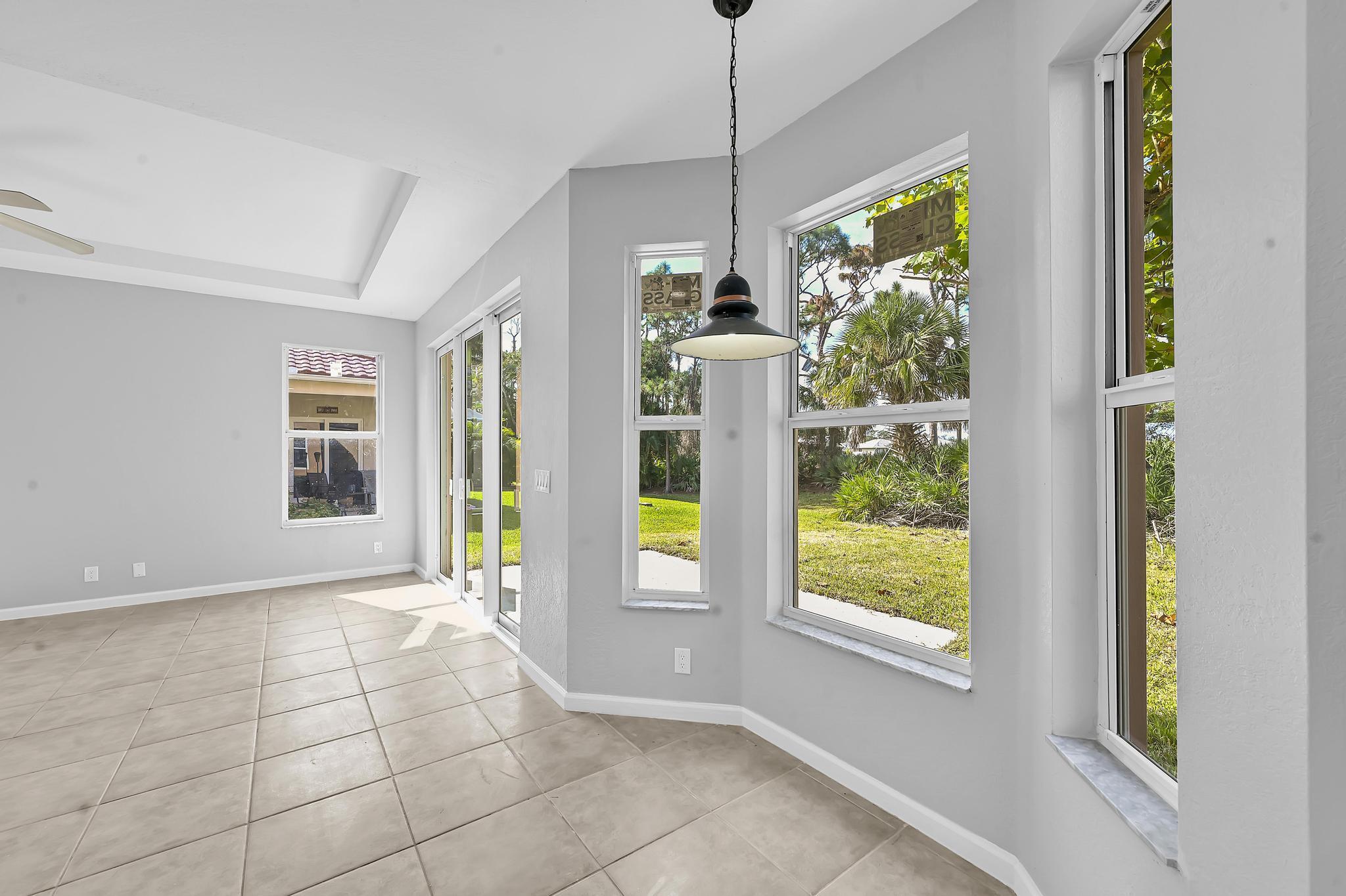 5557 Spanish River Road Fort Pierce, FL 34951 - Photo 13 of 28 a view of an empty room with a window