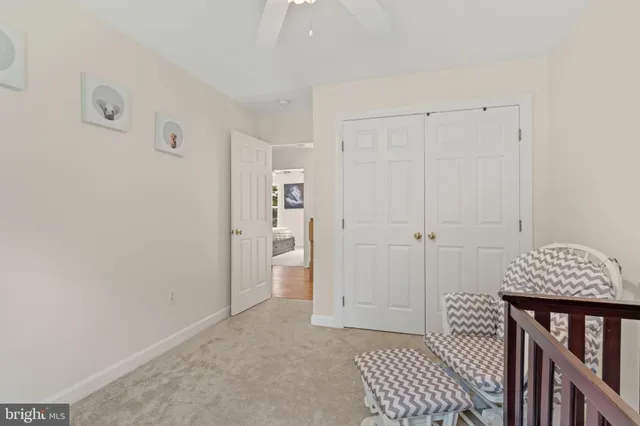 a bathroom with double vanity sink a mirror a glass door a shower and vanity
