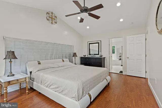 a bathroom with a bathtub and a toilet
