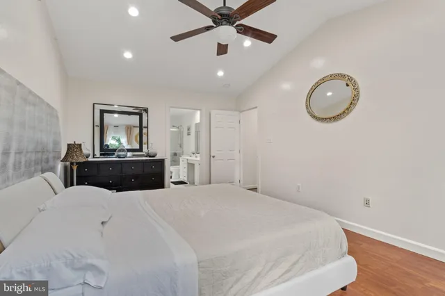 a bathroom with a toilet sink and shower