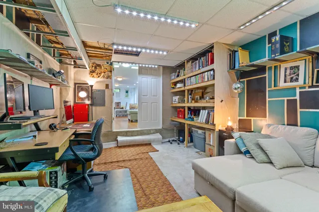 a view of a patio with table and chairs with wooden floor and fence