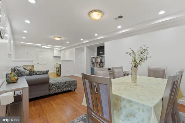 a front view of house with a garden and patio