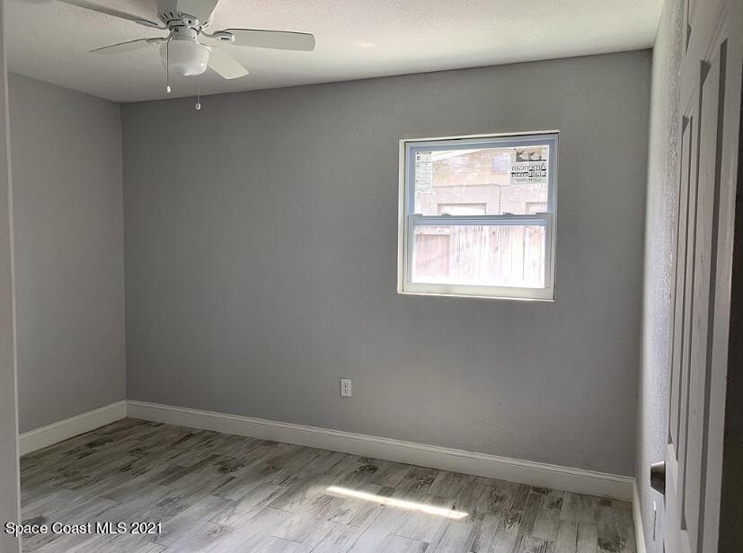 2806 Tropic Road Melbourne, FL 32935 - Photo 11 of 17 an empty room with a window