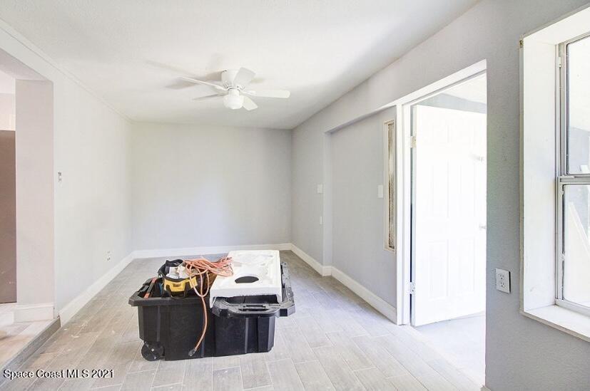 2806 Tropic Road Melbourne, FL 32935 - Photo 8 of 17 a view of workspace with windows