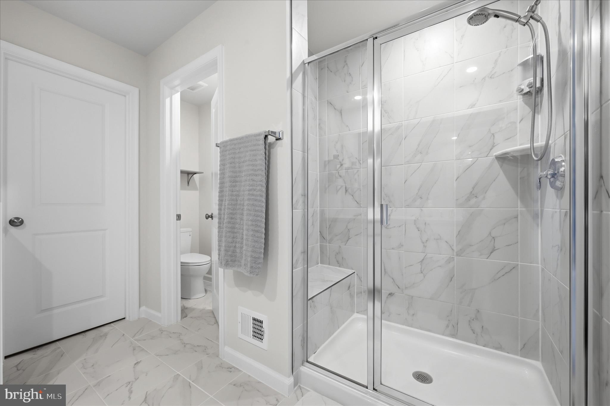 152 National Street Ranson, WV 25438 - Photo 31 of 53 a bathroom with a glass shower door