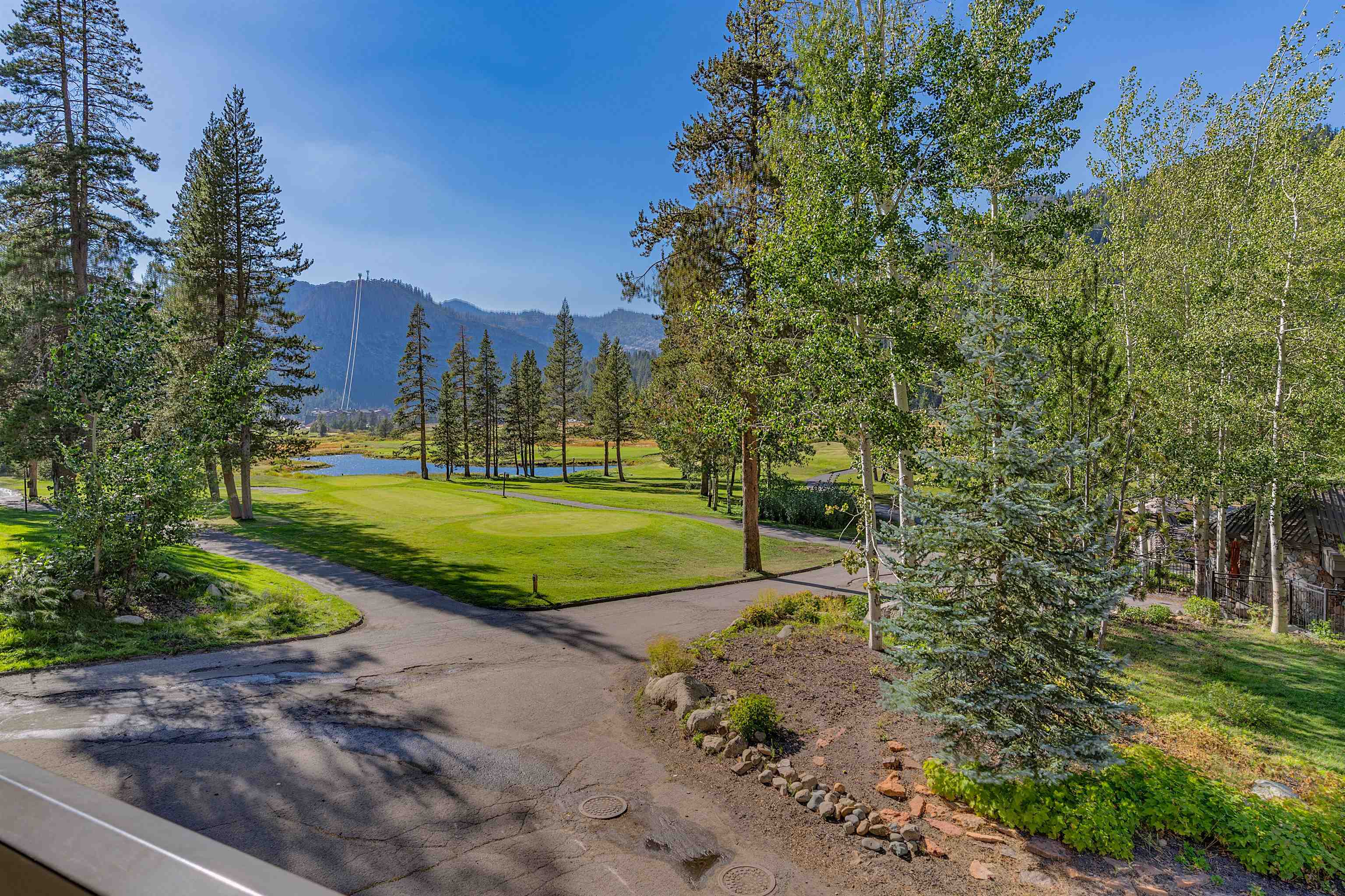 400 Resort Road, Unit 310 312 Olympic Valley, CA 96146 - Photo 15 of 21 a view of a park with large trees