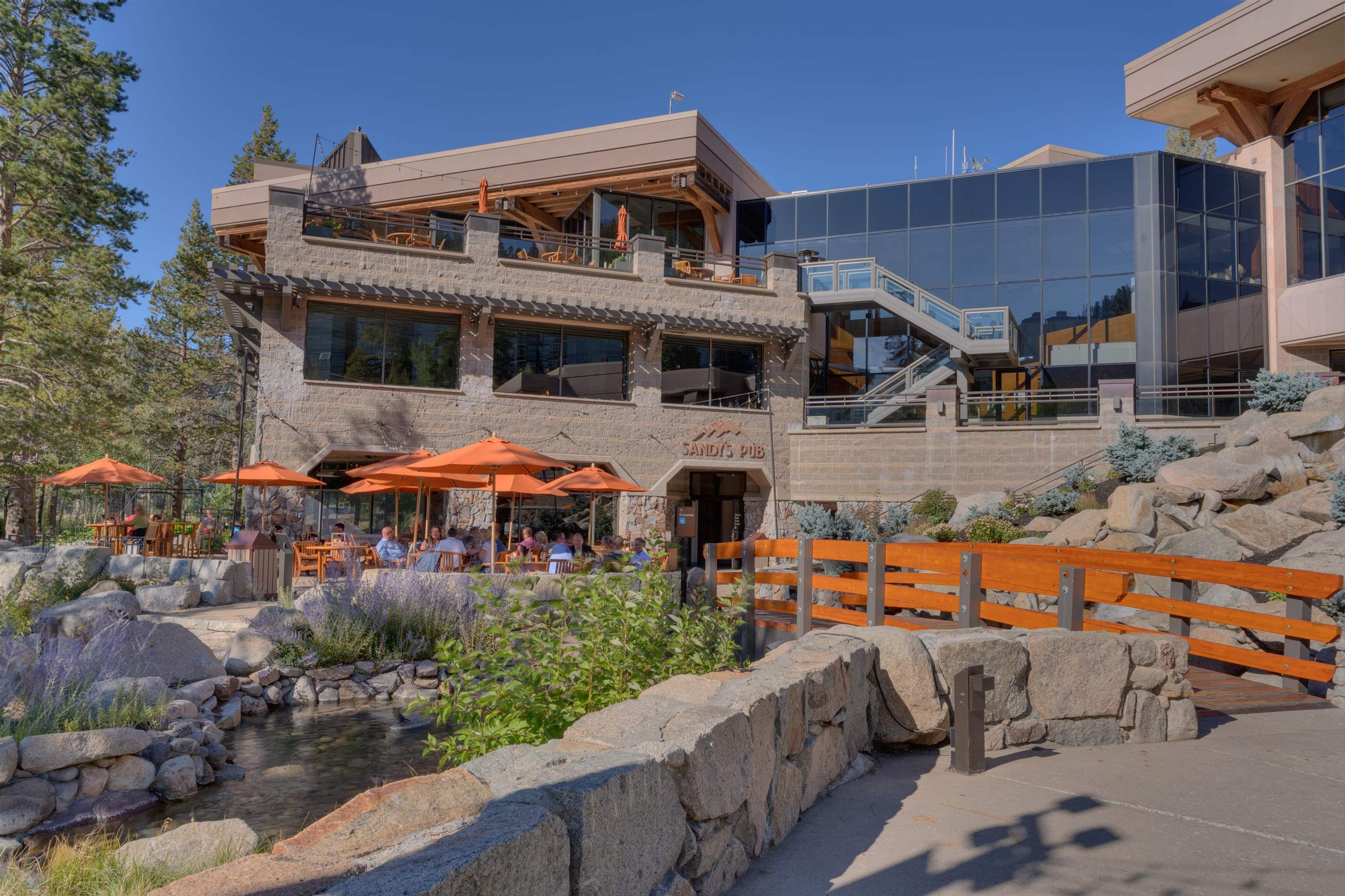 400 Resort Road, Unit 310 312 Olympic Valley, CA 96146 - Photo 17 of 21 a front view of a house with an outdoor space