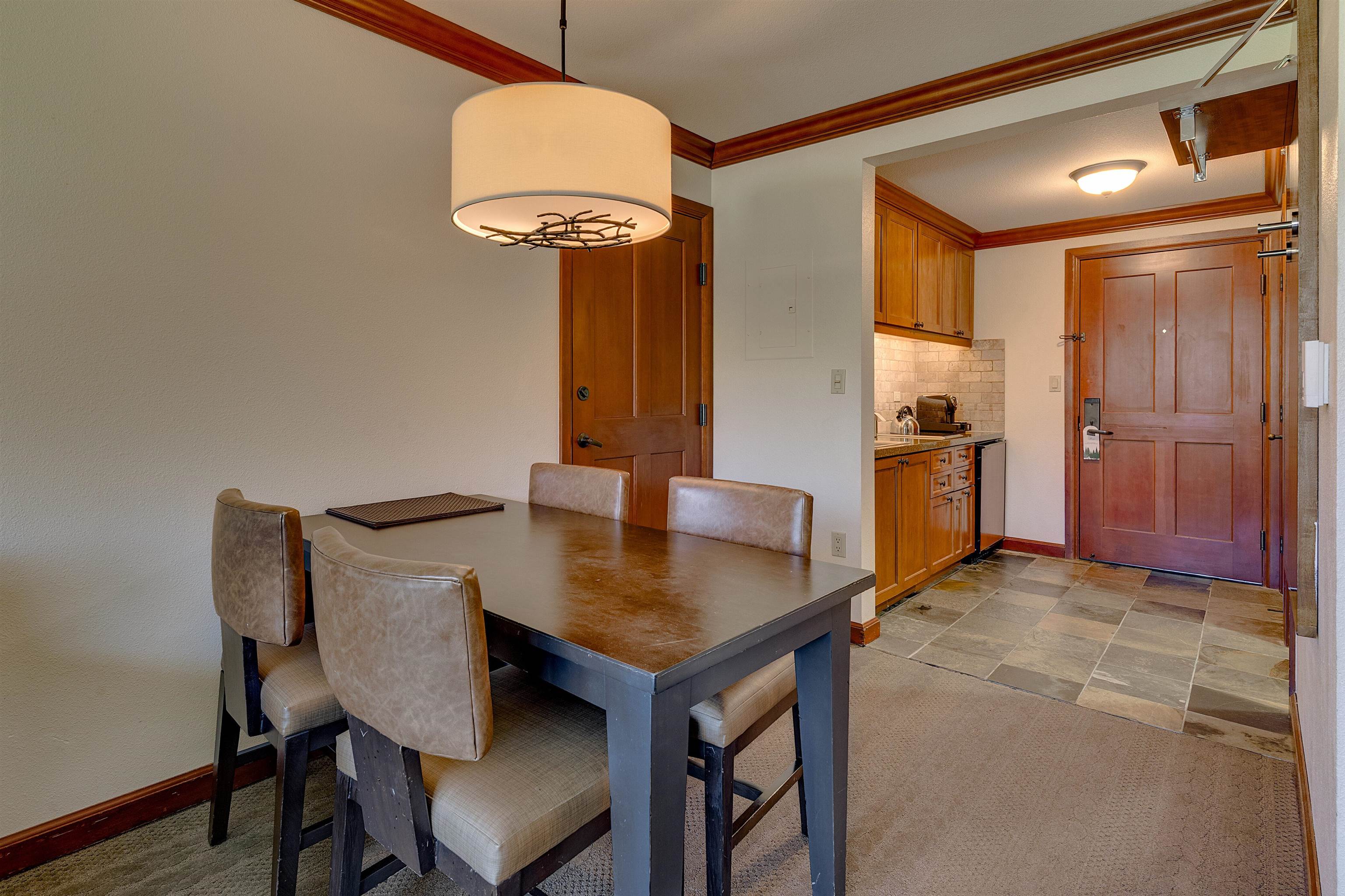 400 Resort Road, Unit 310 312 Olympic Valley, CA 96146 - Photo 4 of 21 a view of a dining room with furniture