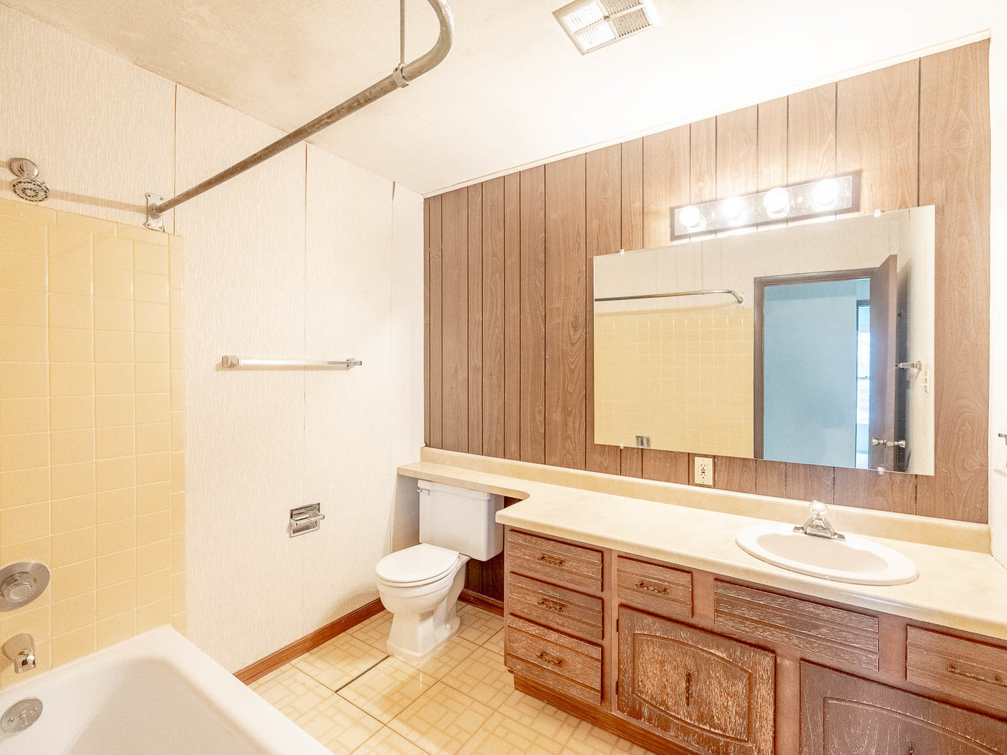 446 Galahad Road Bolingbrook, IL 60440 - Photo 13 of 20 a bathroom with a sink a toilet and shower