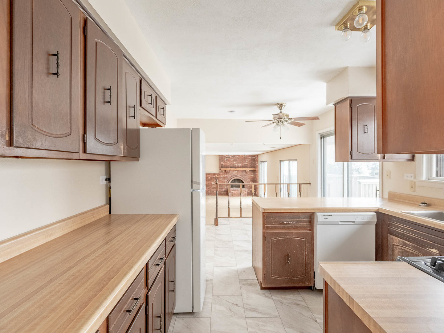446 Galahad Road Bolingbrook, IL 60440 - Photo 6 of 20 a kitchen with a stove and a refrigerator