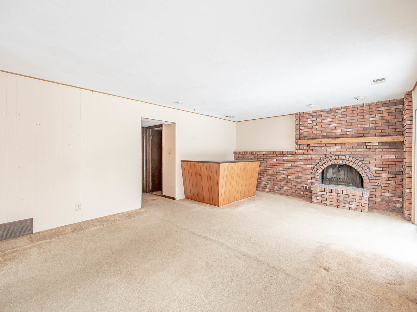 446 Galahad Road Bolingbrook, IL 60440 - Photo 9 of 20 an empty room with a fireplace