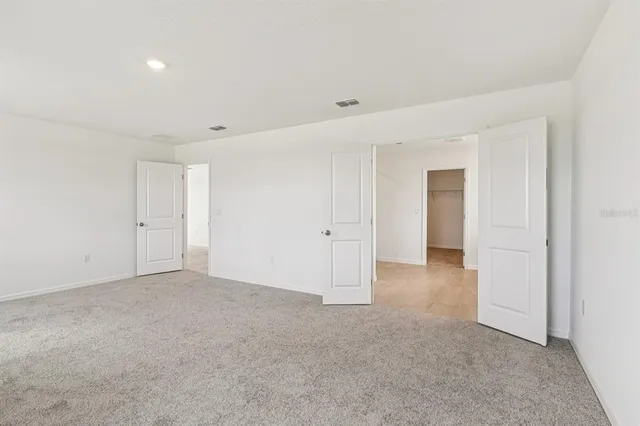 a view of a room with an empty space