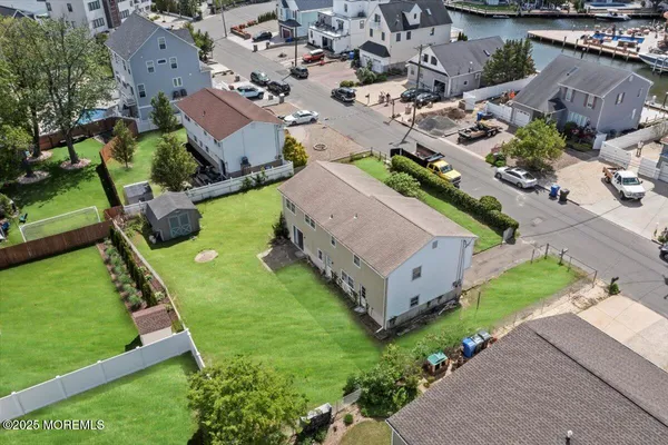 an aerial view of a house with garden
