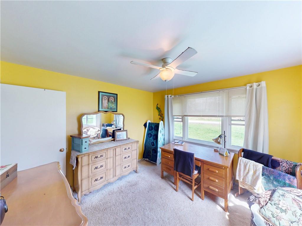 225 Fairway Lane Butler, PA 16002 - Photo 18 of 43 a bedroom with furniture and a large window