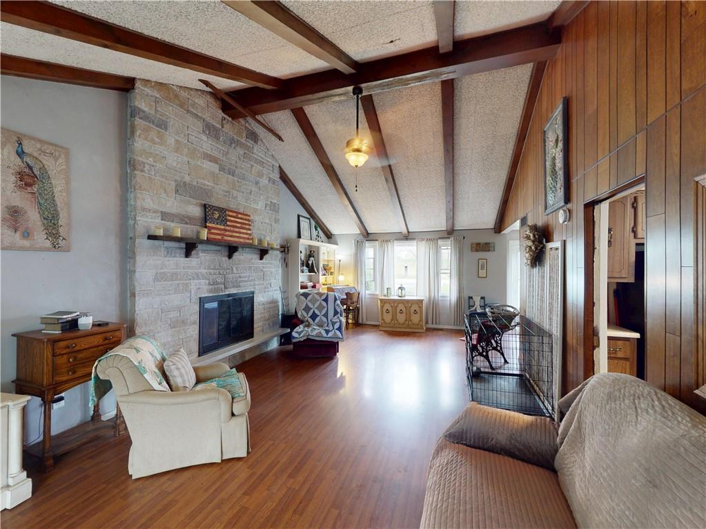 225 Fairway Lane Butler, PA 16002 - Photo 5 of 43 a living room with furniture and a fireplace