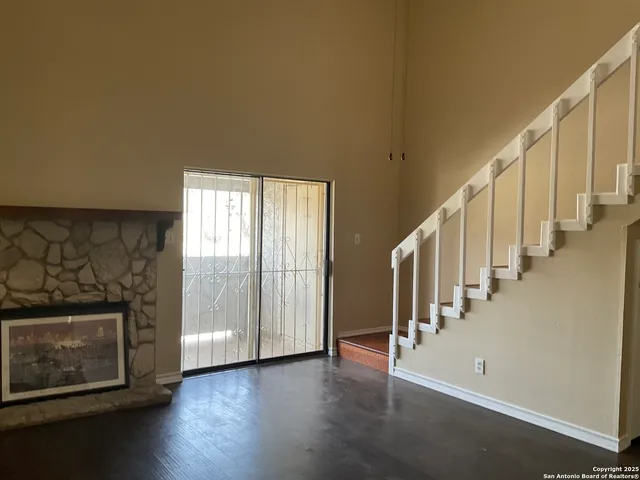 a kitchen with a sink and stainless steel appliances