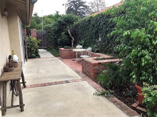 935 Crescent Bend Fallbrook, CA 92028 - Photo 8 of 25 Enjoy your morning coffee or breakfast on this cozy patio! Feel like you're living Inside/Outside with the easy access to the side & rear Patios...